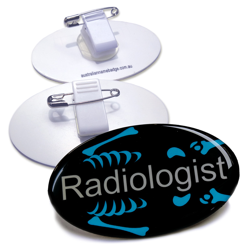 Oval name badges for a Radiologist with clip and pin fixings