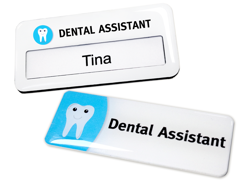 A reuseable name badge and a domed resin name badge for a dental clinic